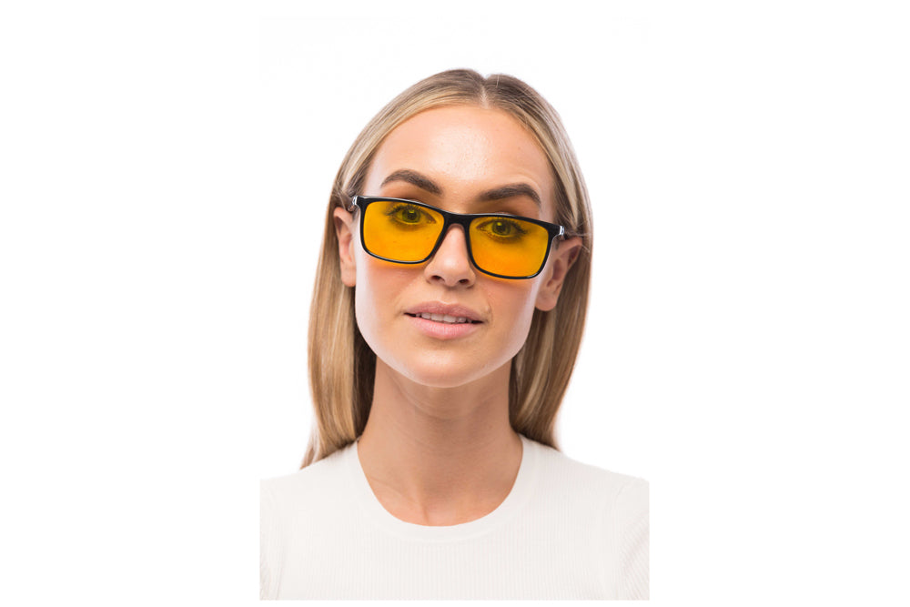 Woman Wearing Brooklyn Light Sensitivity Glasses Readers
