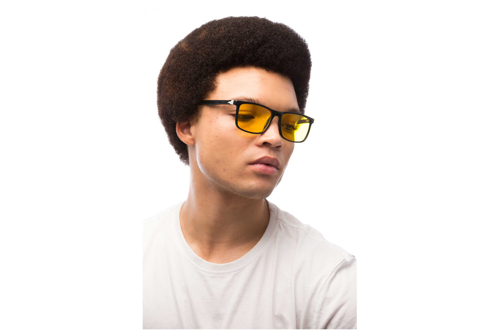 Man Wearing Brooklyn Light Sensitivity Glasses Readers