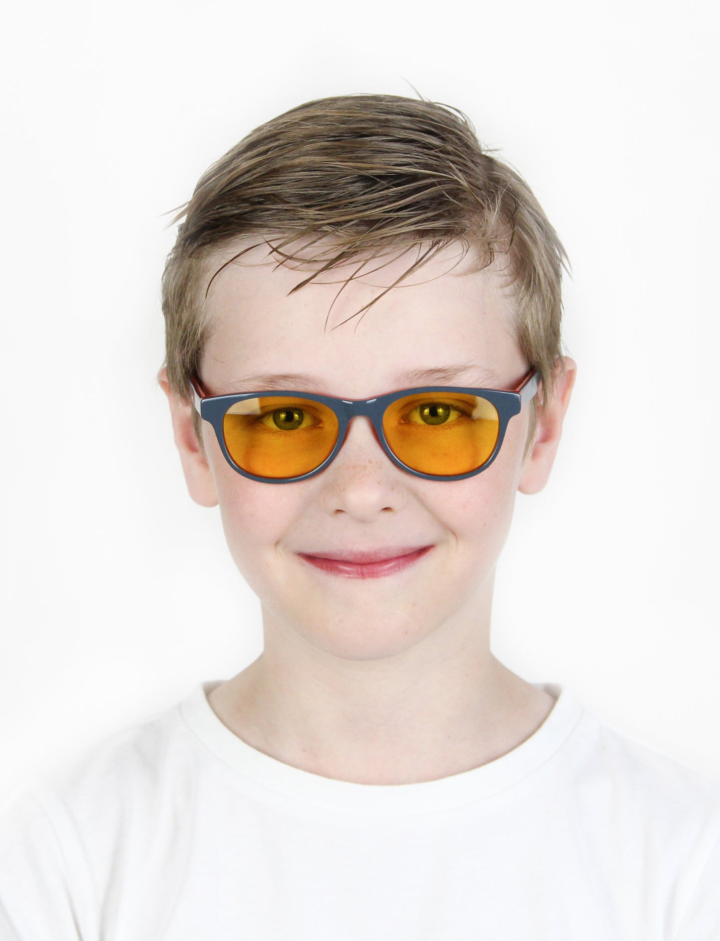 Boy Wearing Piper Light Sensitivity Glasses